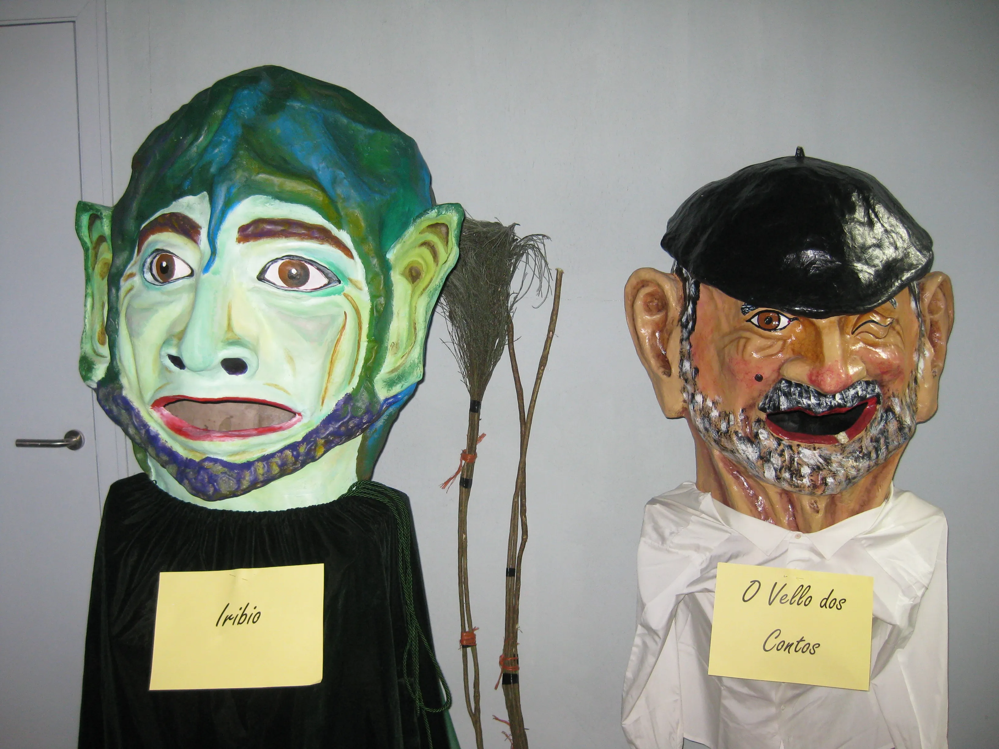 Traditional giant papier-mâché heads displayed in Galicia.