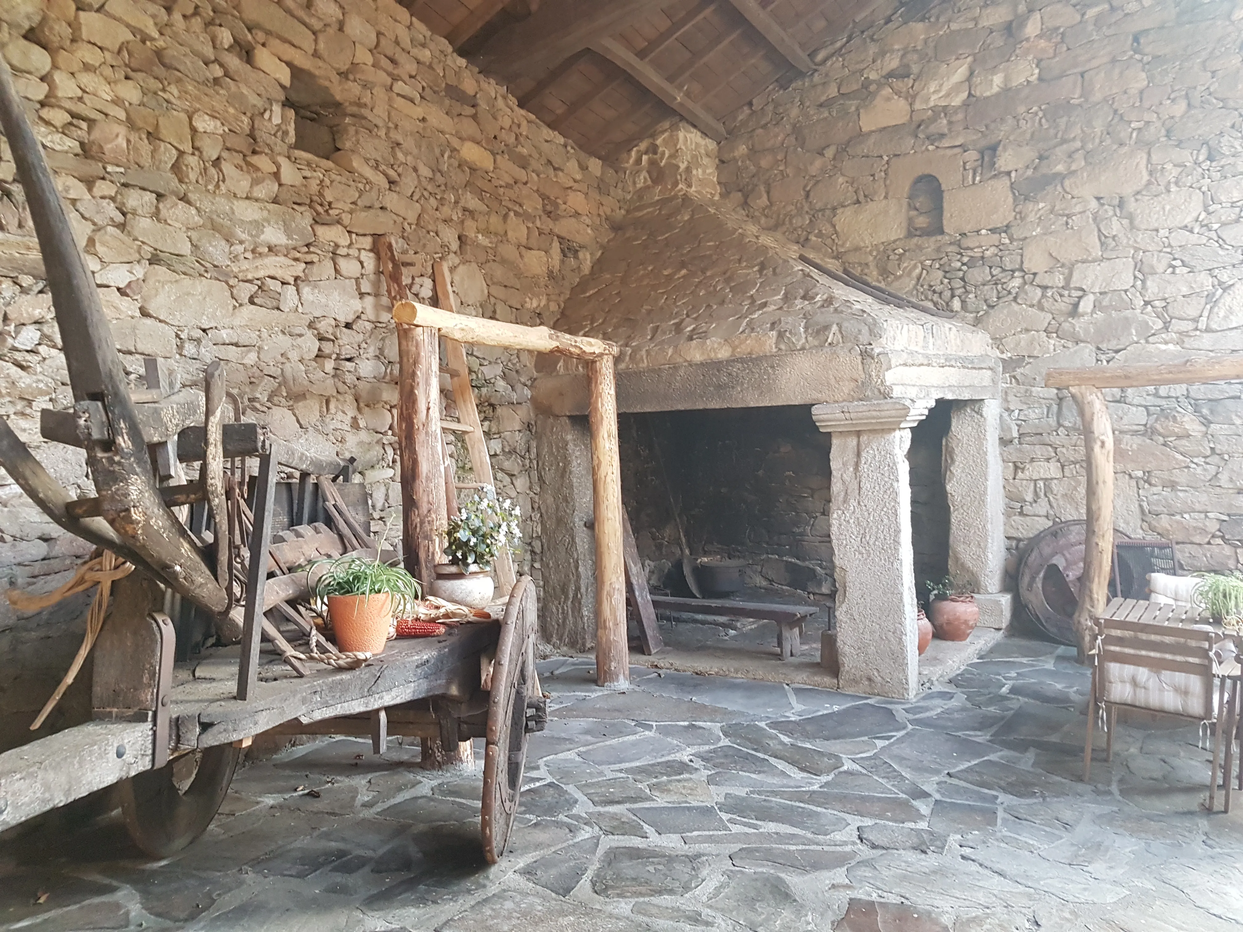 The interior of a traditional Galician stone house associated with the lareira.