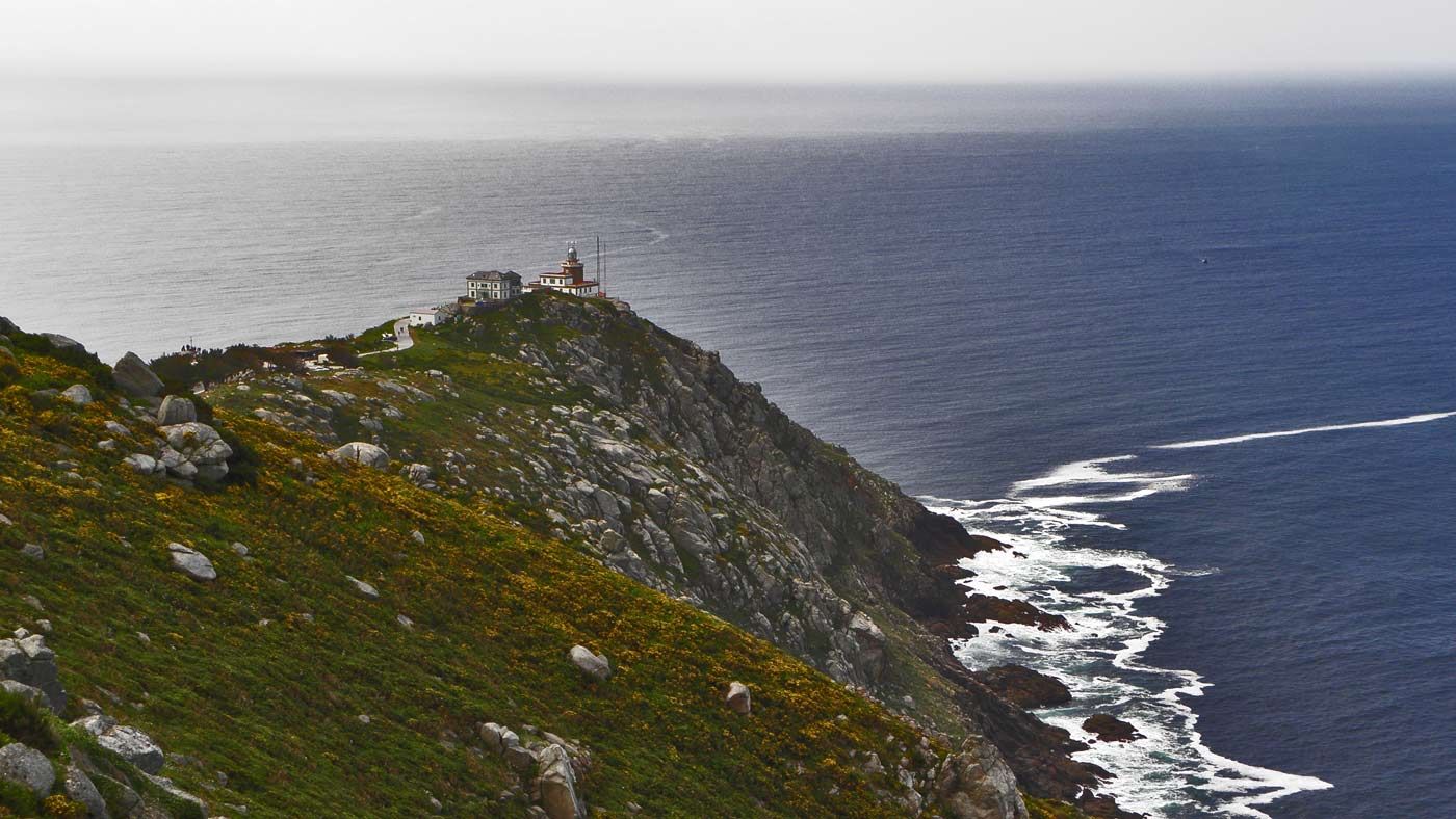 The lighthouse and rocky headland at Cape Finisterre.
