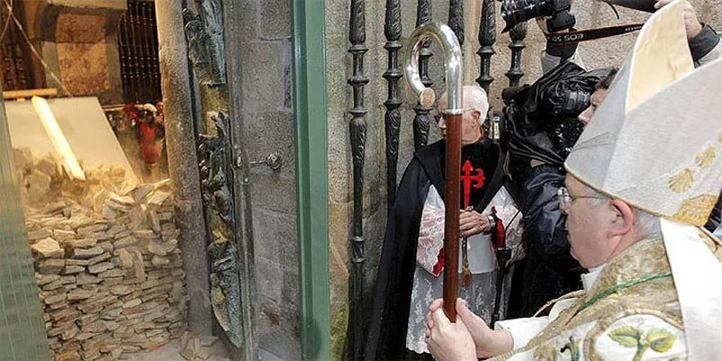 The Holy Door of Santiago Cathedral being opened ceremonially.