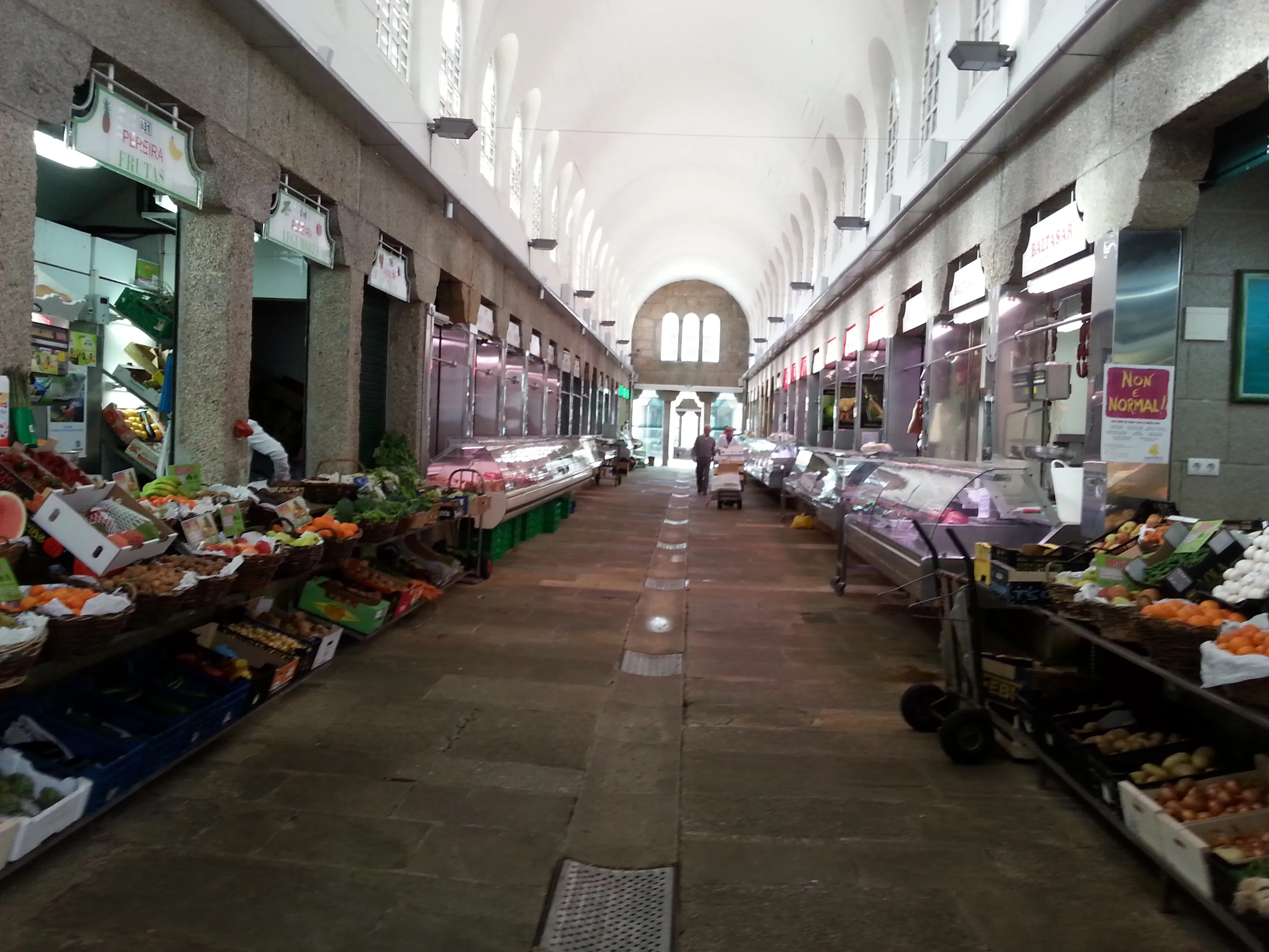 The central aisle and produce stalls inside Santiago de Compostela’s Mercado de Abastos.