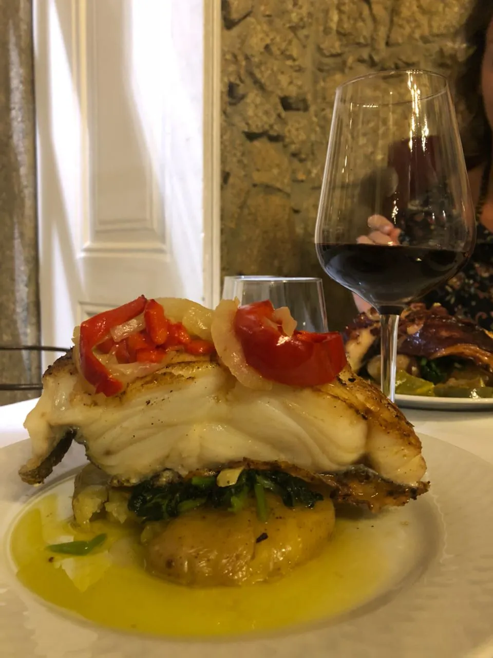 Galician fish served with local vegetables and wine.