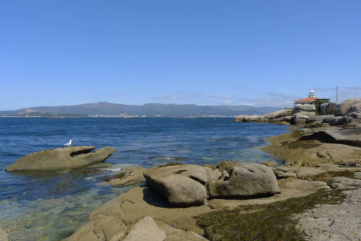 The rocky shore and lighthouse of the Ría de Arousa on the Spiritual Variant.