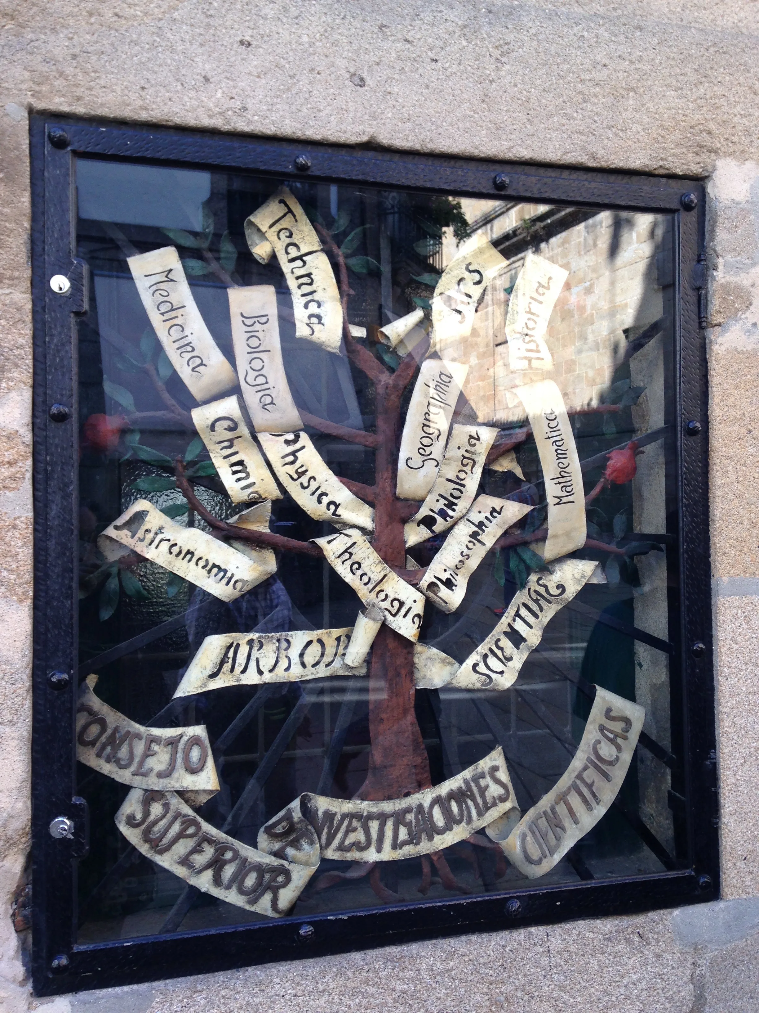 The Tree of Science in Santiago, with university subjects written on its metal branches.