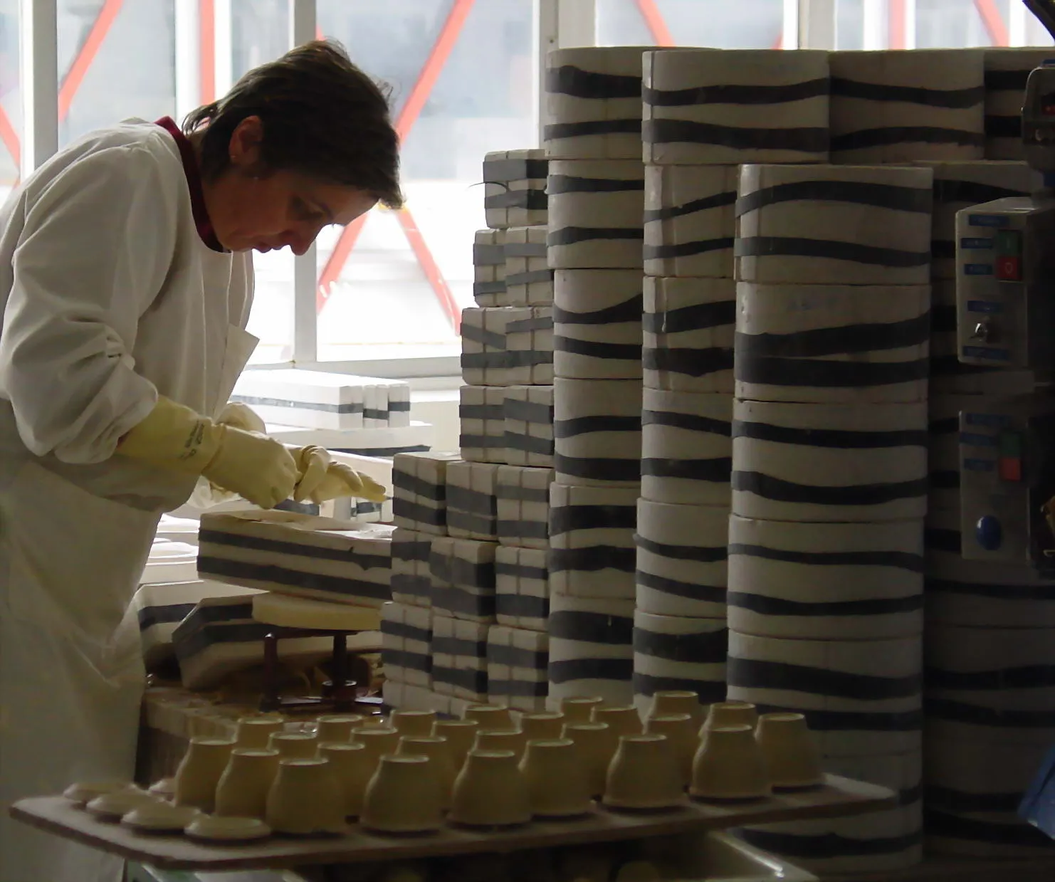 A craftswoman working inside the Sargadelos ceramics factory in Galicia.