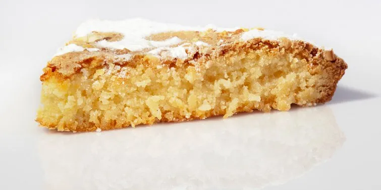 A traditional Tarta de Santiago finished with powdered sugar.